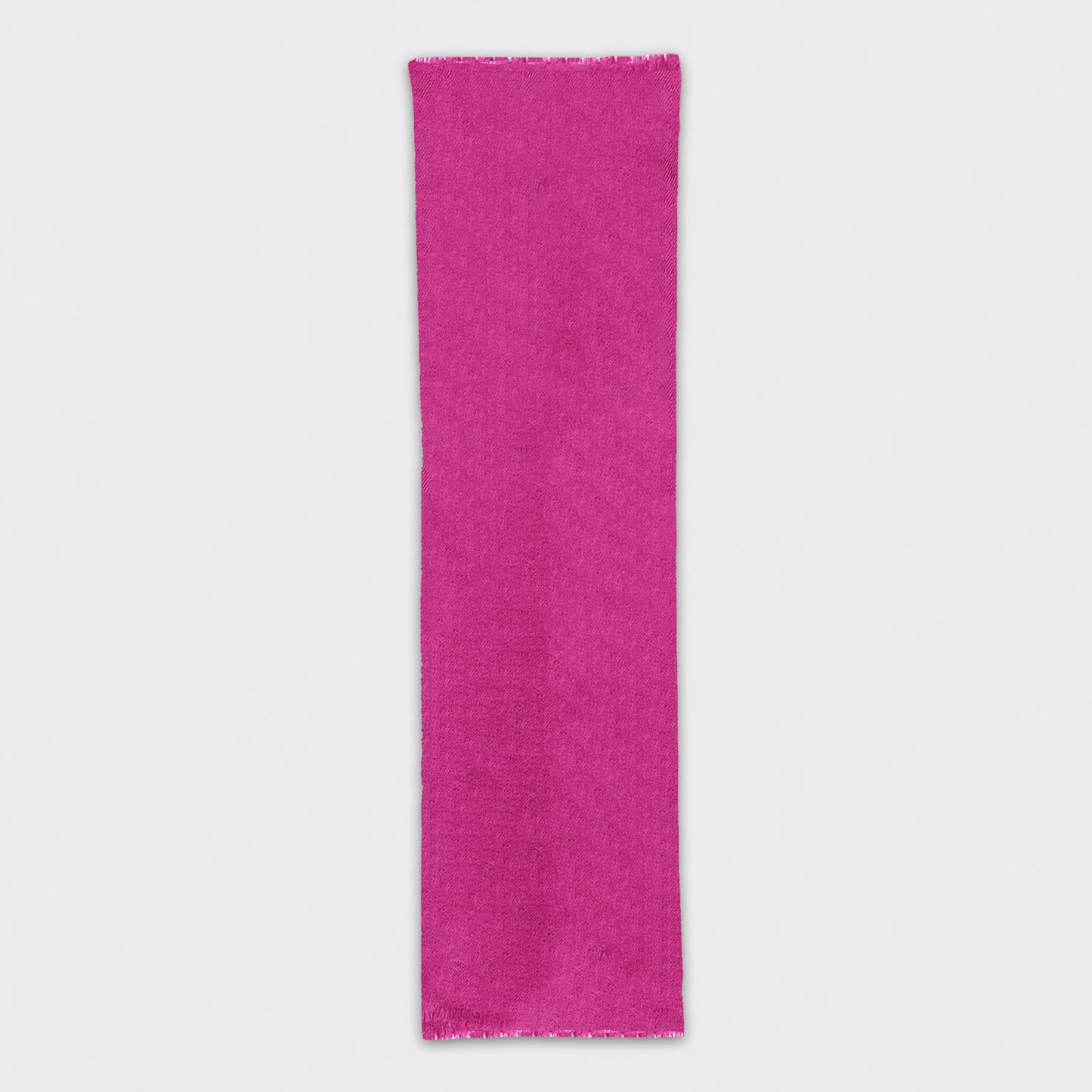 Discover the fucsia cashmere scarf, exclusively crafted in Italy. Shop this luxurious mono color scarf at Wools Boutique Uomo in Geneva.