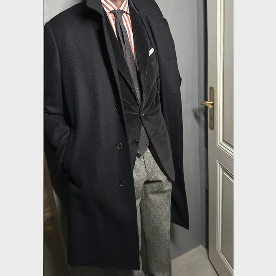 Blue Herringbone Wool Cashmere Tailoring Coat Geneva. Men's tailoring coat made in Italy by Caruso exclusively for Wools Boutique Uomo Geneve, for customers who want a simple and wearable classic men's coat on any occasion.